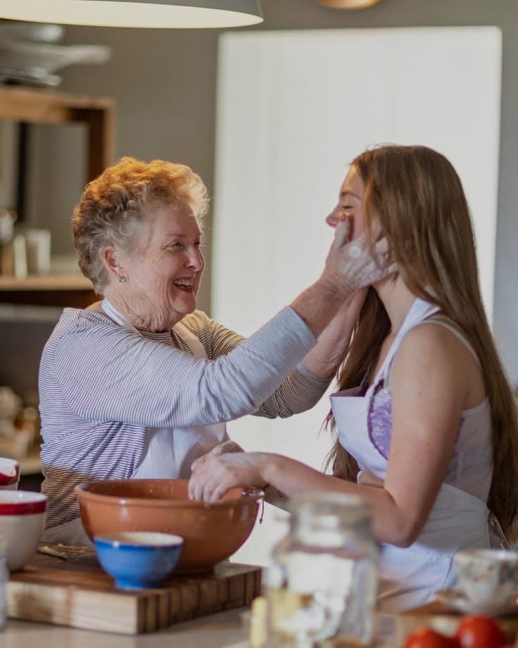 Specialist support worker with participant in their home
